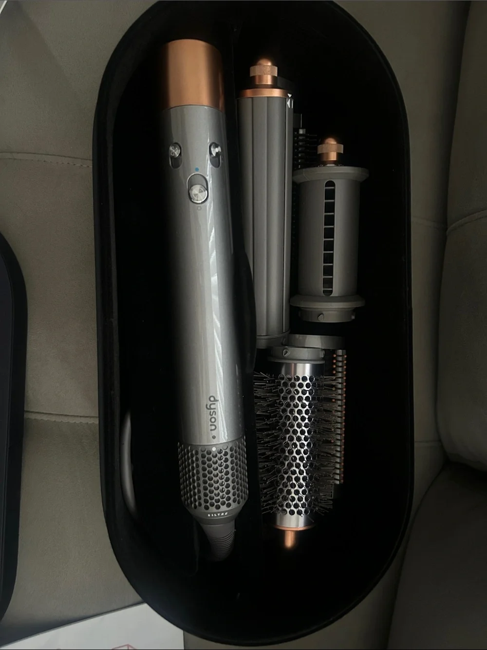 Dyson Men’s/Women’s Hair Styler in Gray with Copper Accents.